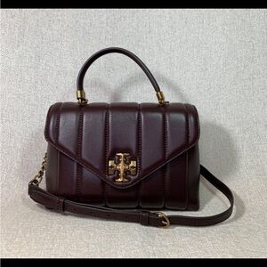 Tory Burch Quilted Top-Handle Satchel in Deep Burgundy with Gold Hardware.